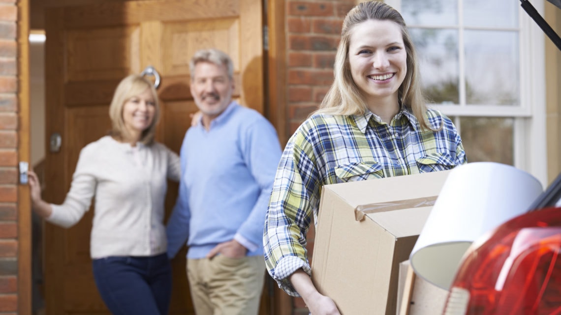 A young woman moving out from her parents' home